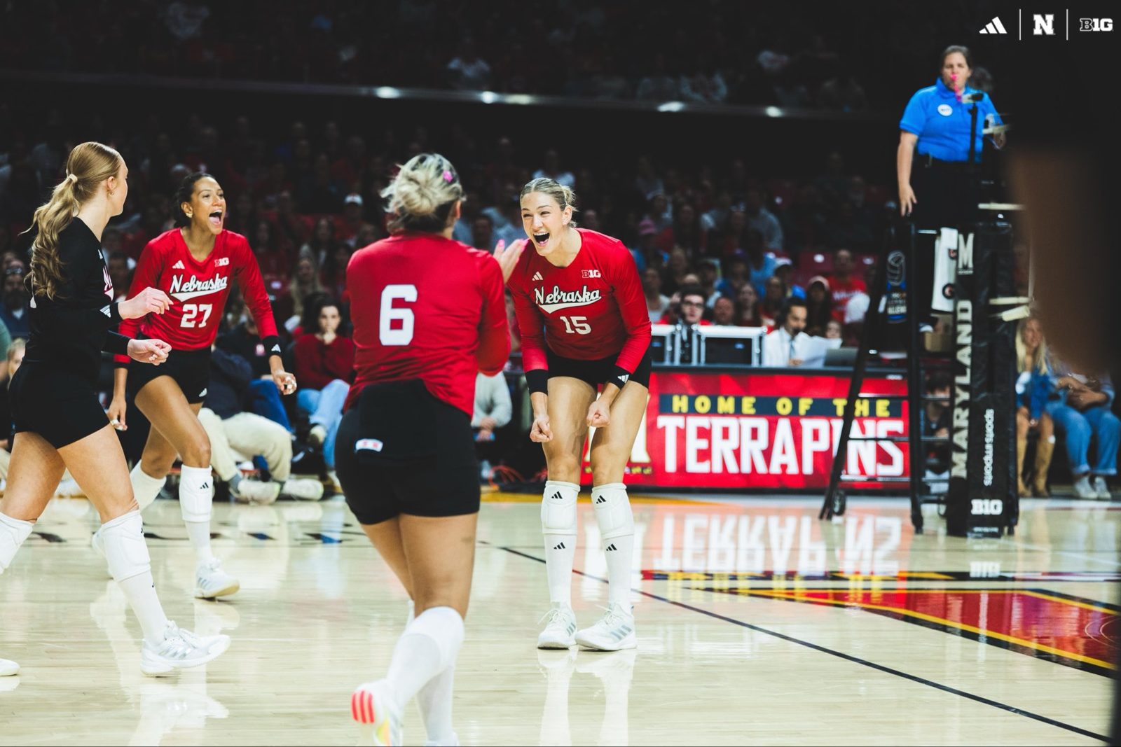 Nebraska Huskers volleyball players on court during the 2026 Maryland match.
